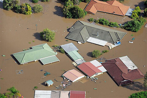 Floods in Ipswich swamped more than 3,000 homes and businesses. Image courtesy of AP: Dave Hunt.