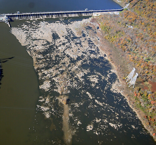 Conowingo Dam is the last Dam on the Susquehanna River before it empties into the Upper Chesapeake Bay. This is a series of photos taken on an overflight of the Dam and surrounding sites during mid-November, 2015. Riff raff down stream from Conowingo Dam. Conowingo Dam 12.