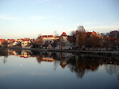 The town of Landshut, Germany lies along the River Isar, a tributary of the Danube River. 