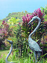 These crane statues overlook a magnificent vista in the Garden of Eden, in Maui, Hawaii
