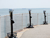 These magnifying glasses give a view of Chesapeake Bay and the Chesapeake Bay Bridge Tunnel. 