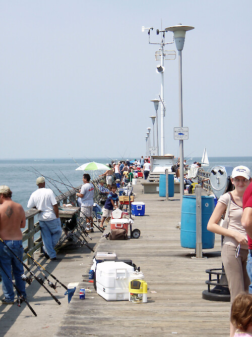 On a clear day, the fishing pier at the Chesapeake Bay Bridge Tunnel is packed with people 