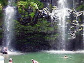 Swimming in a lagoon formed by a waterfall on Maui