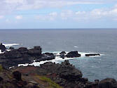 Lava forms portions of the Pacific coastline along Maui