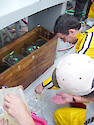 Water samples from the Patuxent River are collected and prepared for analysis on board the R/V Aquarius 