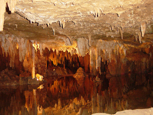 Minerals build up to form stalactites (formed down from the ceiling) and stalagmites (formed up from the ground) in Luray Caverns