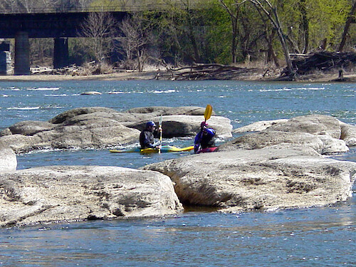 Kayakers recreate near the confluence of the Potomac and Shenandoah Rivers at Harper's Ferry National Park, West Virginia 