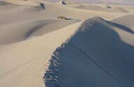 It is easiest to walk along the ridge of a sand dune, such as these found at Mesquite Flat Dunes. Death Valley has quite a variety of topography and geologic formations.