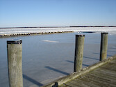 A view of a frozen Choptank River from the dock at Horn Point Laboratory, in Cambridge, Maryland. 