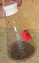 A sediment slurry was mixed and the flask capped to trap gases formed as intermediary steps of denitrification.