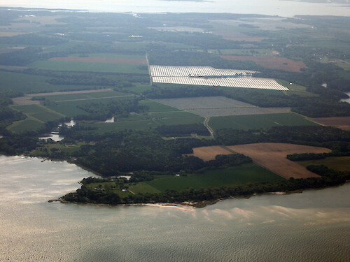 Looking east at farms on Old Town Neck. Chesapeake Bay is in the foreground and Ramshorn Bay, a coastal lagoon, is in the background.