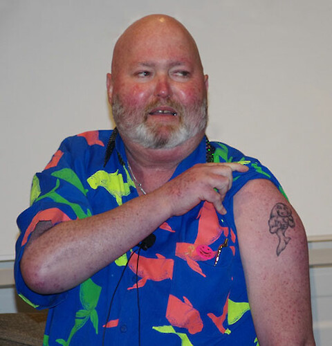 Peter Oliver and his dugong tattoo.