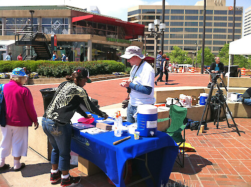 On April 20,2012, the Waterfront Partnership, BioHabitats and Kids at Living Classroom created a floating wetland in the baltimore harbor. This included a public outreach event for students and other citizens.
