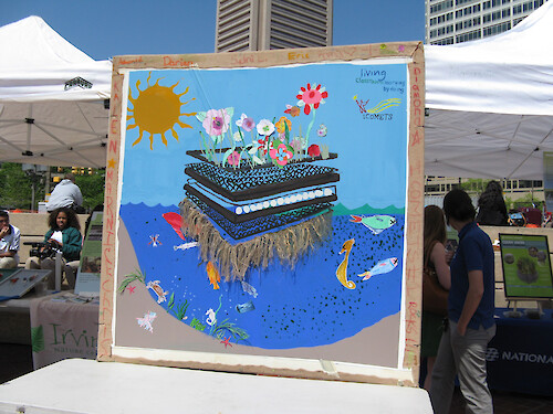 On April 20,2012, the Waterfront Partnership, BioHabitats and Kids at Living Classroom created a floating wetland in the baltimore harbor. This included a public outreach event for students and other citizens.