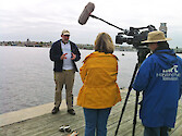 Bill Dennison is interviewed for the MPT/Living classroom water quality demonstration in Baltimore, Maryland