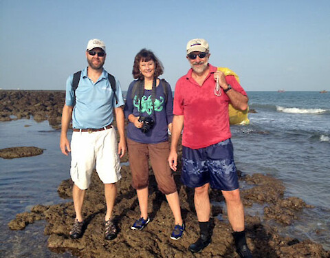Heath Kelsey, Jane Hawkey and Bill Dennison standing on the shore of the Gulf of Kachchh.