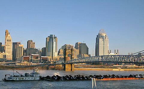 A barge tow making its way upstream past Cincinnati, OH. Credit: Angela Freyermuth, Outreach and Customer Relations Specialist, U.S. Army Corps of Engineers