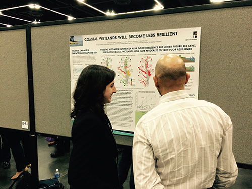 Explaining the poster during the Monday night poster session.