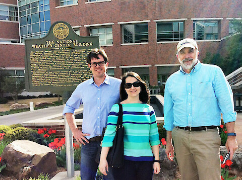 Simon Costanzo, Brianne Walsh and Bill Dennison in front of the National Weather Center.