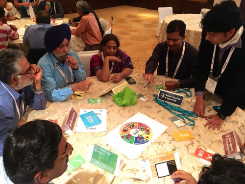 participants playing the report card game at River Symposium 2016.