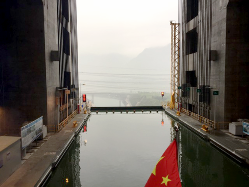 View from the back of the ship as it and the water it was floating in is hoisted 180 m up the dam wall. Image credit: Simon Costanzo