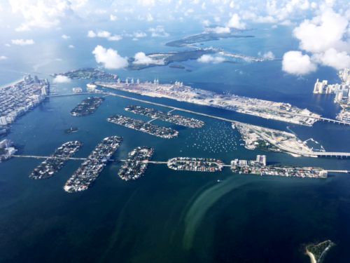 The north end of Biscayne Bay from my airplane window. The large island in the middle is Dodge Island from where my research cruises departed. Image credit: Bill Dennison