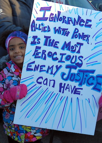Little girl holding a sign during a Black Lives Matter march.