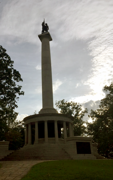 New York Peace Monument atop Lookout Mountain with a confederate and union soldier shaking hands. Image credit Bill Dennison