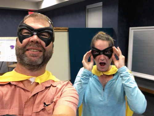 Heath Kelsey and Emily Nastase in their superhero masks and capes. Image credit Heath Kelsey