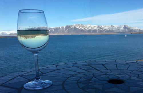 In Natalie Peyronnin's example of the rule of thirds, think about where your eye starts and ends. There's wine? And a table. And mountains. Because the wine dominates the narrative of the image, the assumption is that the location is celebratory - we're on a vacation!