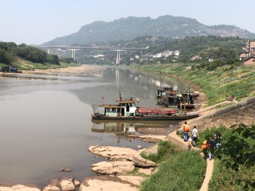 Sampling water in the Chishui River at the confluence of the Yangtze River near Hejiang in Sichuan Province. Image credit Simon Costanzo