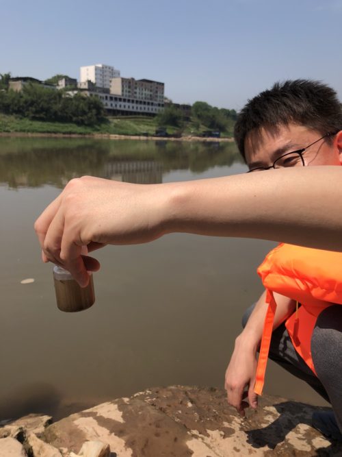 Preparing to sample water quality in the Chishui River at the confluence of the Yangtze River near Hejiang in Sichuan Province. Image credit Simon Costanzo