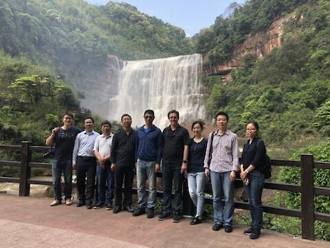 Project team visiting Shizhang Cave Waterfall along the Chishui River. Image credit Simon Costanzo