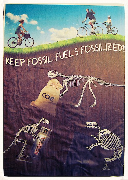 A graphic depicting fossils underground while people above ground ride bicycles.