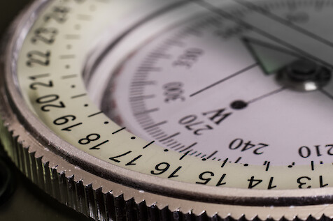 An image showing an up close look at a compass.