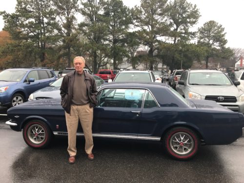 Ken Moore standing in front of his mustang that he drove to the Virginia Institute of Marine Science on his first day and his last day of work, separated by 45 years. Photo credit: Bill Dennison.