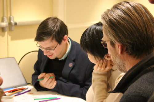 Participants sketching their CRA's conceptual diagram. Photo credit: Sky Swanson.