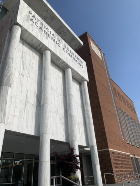 A tall white marble and brown brick building that is the  Patricia R. Guerrieri Academic Learning Commons Building, where the Chesapeake Studies Conference was held.