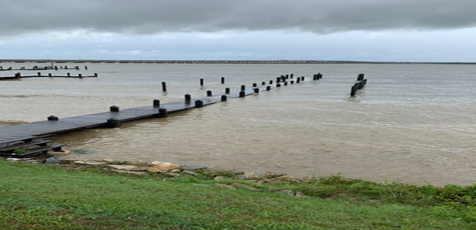 A picture of the author’s dock on the Choptank River with the water level above the dock, showing the impact of storms exacerbated by sea level rise. Photo by Colin Vissering on August 4, 2020.