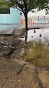 Impervious surfaces like roofs and parking lots cannot absorb water. A large volume of rainfall in a relatively short period of time produces runoff, which carries sediments and chemicals into bodies of water. Storm drains cannot always handle the volume of water, or get backed up for other reasons, creating puddles like this one in a parking lot. Video taken in Arnold, Maryland.